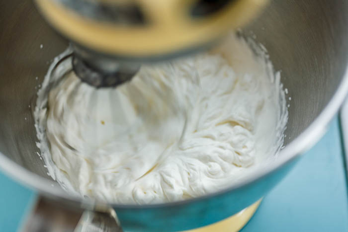 whipped cream with defined whisk tracks 