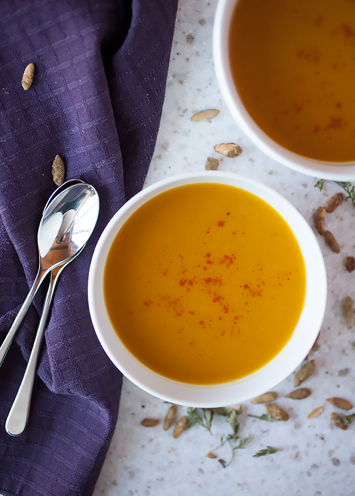 Warming, healthy, and filling, this simple recipe for spiced pumpkin and carrot soup uses the best of fall's produce to make you a wonderful fall dinner!