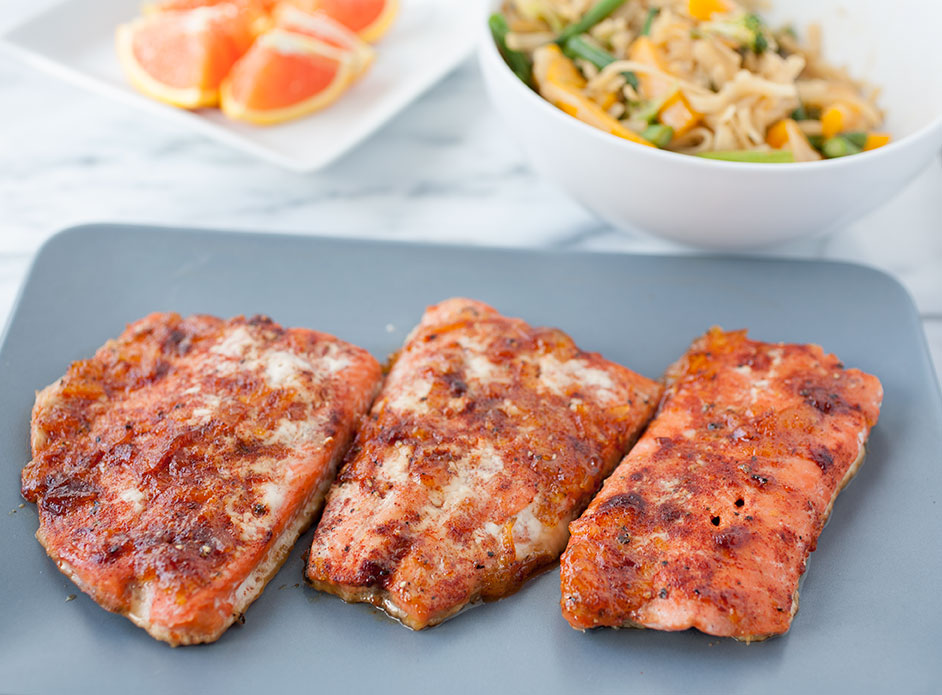 The orange and red chile in this orange red chile salmon adds a beautiful flavor and a spicy bite for a healthy and delicious New Year. 