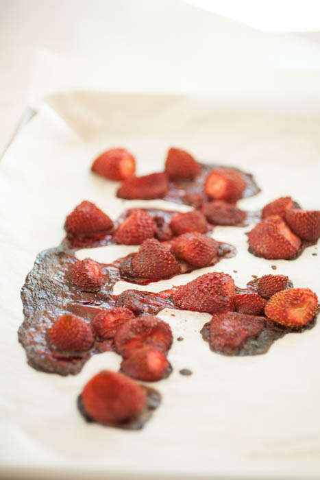 strawberries out of the oven on a sheet pan.