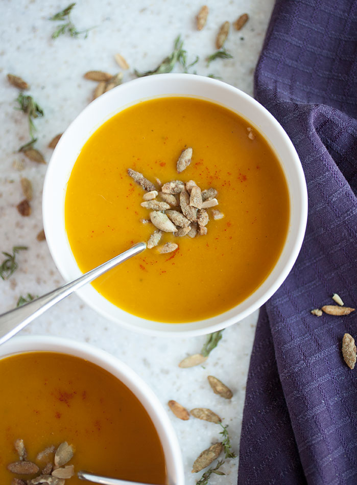 This simple, healthy recipe for spiced pumpkin and carrot soup will warm you up on cold fall evenings!