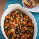 Savory Brussels sprouts with crisped edges are mixed with creamy sweet potatoes and crispy, flavorful bacon is the perfect easy-to-make Thanksgiving side dish!