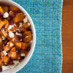 This easy Thanksgiving side dish has sweet from the butternut squash, sweet potatoes, and roasted onions, salty creaminess from the feta cheese, a delicious savory layer from the Greek herbs, and a sweet tang from the pomegranate seeds! And most of the work is done by the oven!