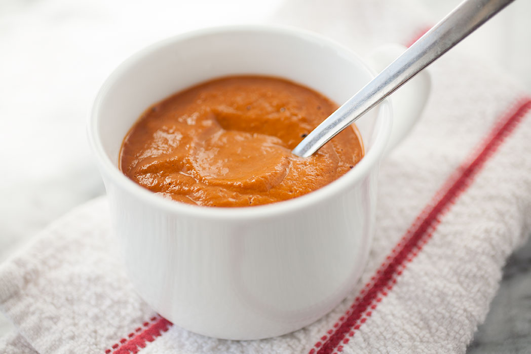 Sweet, slow-roasted tomatoes combine with only a handful of other ingredients for this warming, homemade creamy tomato soup. In about an hour, you’ll have an amazingly delicious, warming soup to combat the cold!