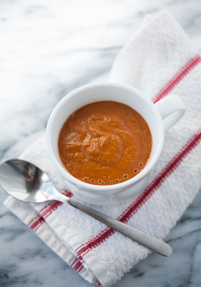 Sweet, slow-roasted tomatoes combine with only a handful of other ingredients for this warming, homemade creamy tomato soup. In about an hour, you’ll have an amazingly delicious, warming soup to combat the cold!